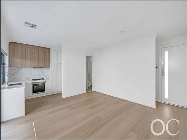 Open the Door To Brand New Two Level Living