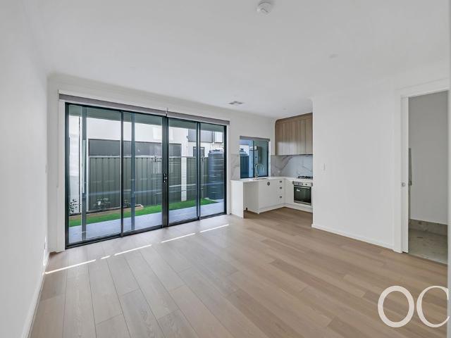 Open the Door To Brand New Two Level Living