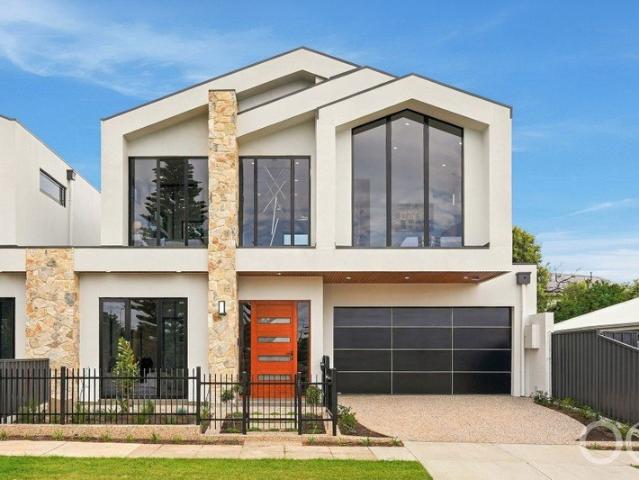 Open the Door to Brand New Luxury Living Just Steps From the Beach