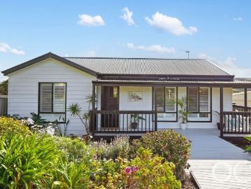Open the door to coastal comfort with versatile indoor outdoor living