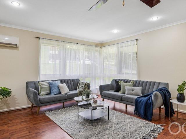 Open the Door to Coastal Comfort and an Entertainer's Deck