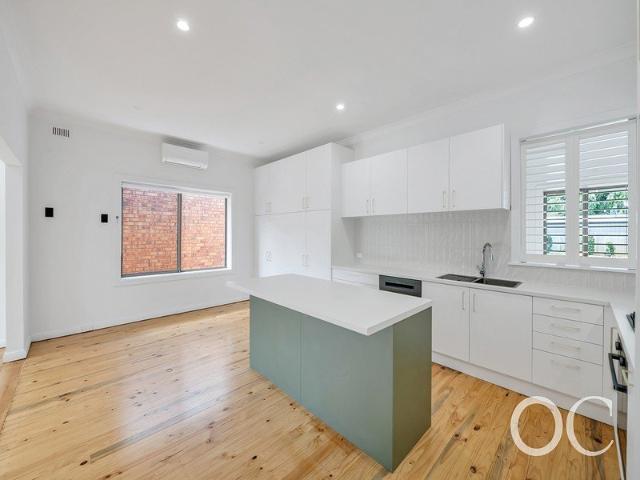 Open the door to coastal comfort & entertainer appeal