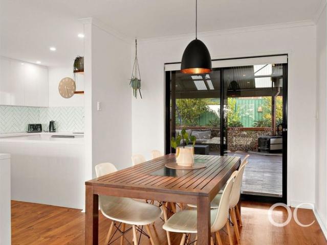 Open the Door To Coastal Entertaining Just Moments from the Beach