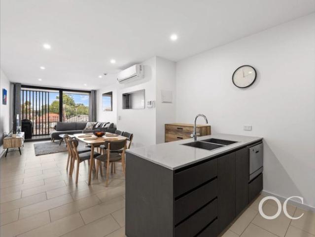 Open the Door to Contemporary Apartment Living with Sweeping Hills Views
