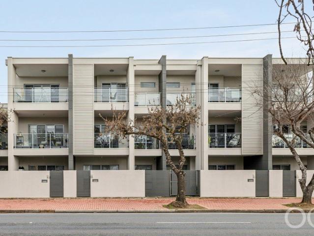 Open the Door to Contemporary Comfort, Effortless Convenience and a Lifestyle Location