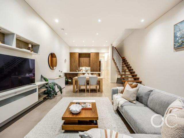 Open the Door to Designer Living in the Heart of Norwood