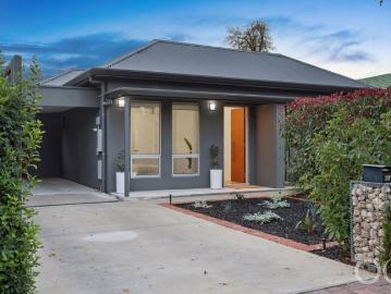 Open the Door to Low Maintenance, Family Space and City Proximity