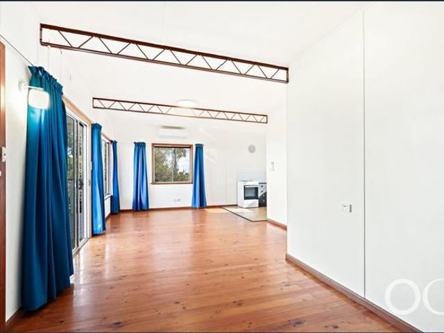 Open the door to easy coastal living