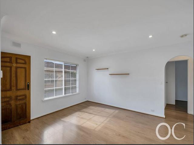 Open the door to easy care living with a private courtyard retreat