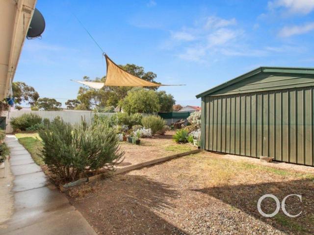 Open the Door To Easy Family Living in a Convenient Location