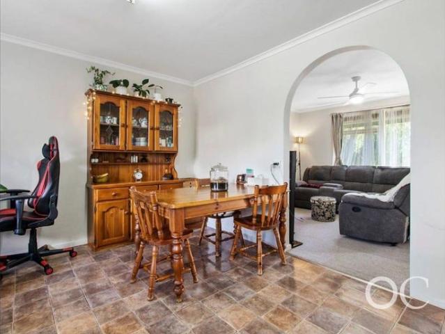 Open the Door To Easy Family Living in a Convenient Location