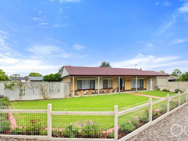 Open the Door to Easy Family Living on a Generous Corner Block