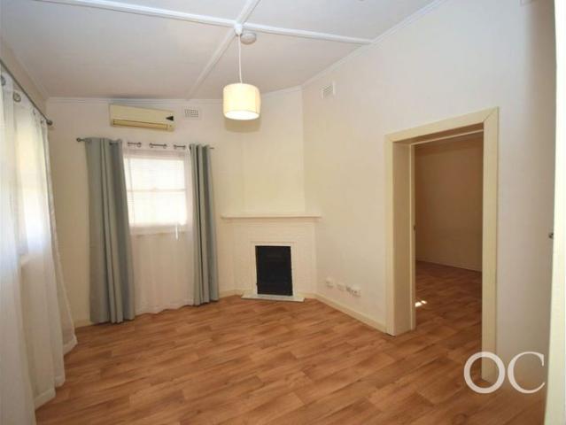Open the Door To Easy Living in a Convenient Daw Park Location