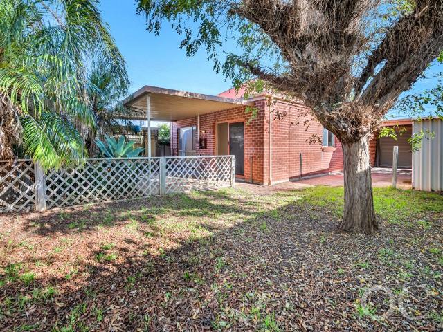 Open the Door To Effortless Entertaining in a Charming Cottage Setting