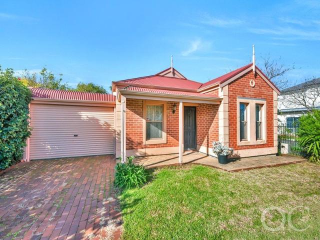 Open the Door To Effortless Entertaining in a Charming Cottage Setting