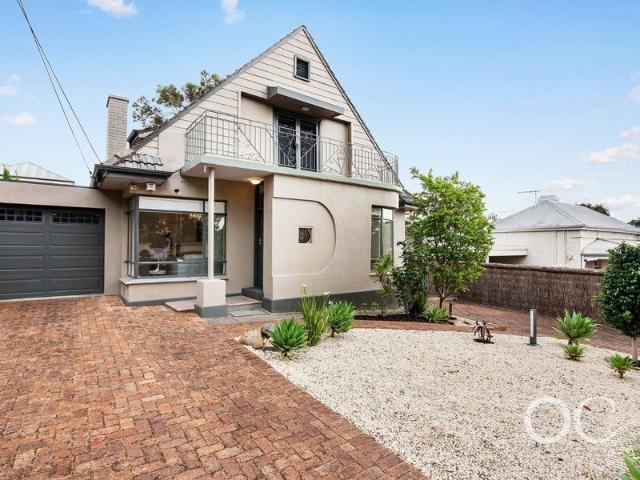 Open the Door To Elegant Family Living in Prestigious Burnside