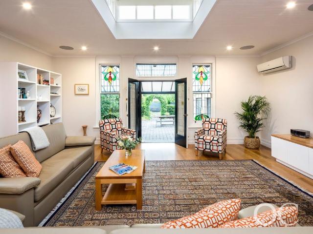 Open the Door To Grand Villa Living in a Coveted Rose Park Corner