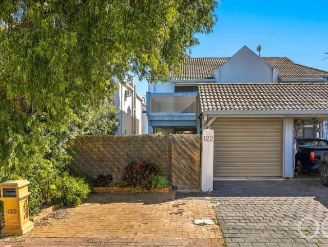 Open the Door to Low Maintenance, Living by the Marina