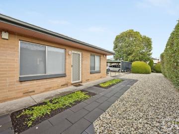 Open the Door to Low Maintenance Living in a Fantastic Location
