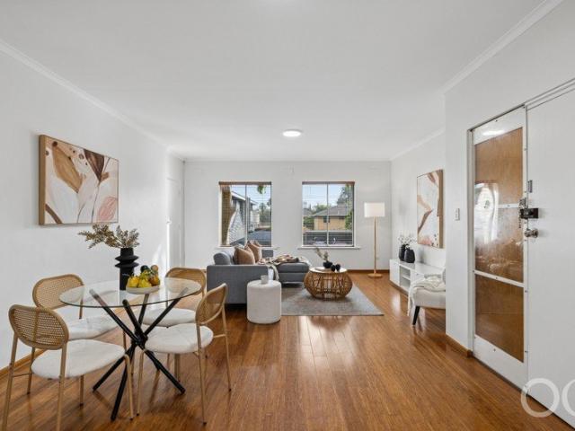 Open the Door to Low Maintenance Living in a Fantastic Location