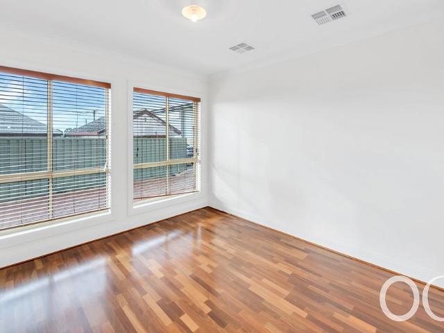 Open the door to relaxed coastal living in a prime seaside location