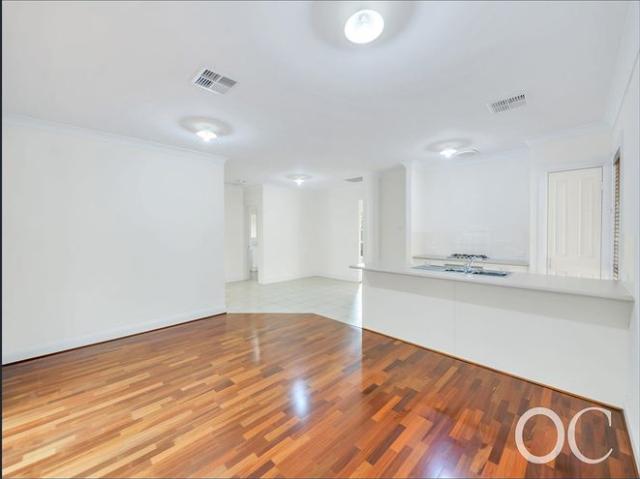 Open the door to relaxed coastal living in a prime seaside location