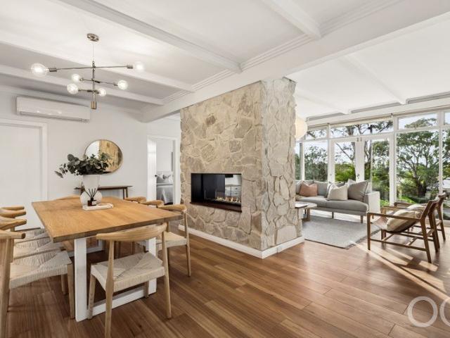 Open the Door to Renovated Mid Century Living