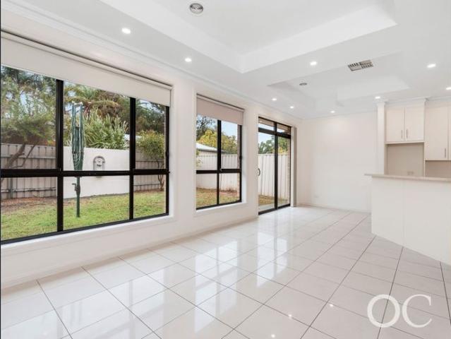 Open the Door To Stylish, Easy Care Living in a Prime City to Coast Location