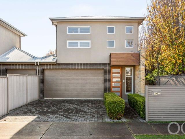 Open the Door to Stylish Living Perfectly Positioned Between the City & the Sea