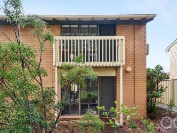 Open the Door to Stylish Townhouse Living in a Location That Connects It All