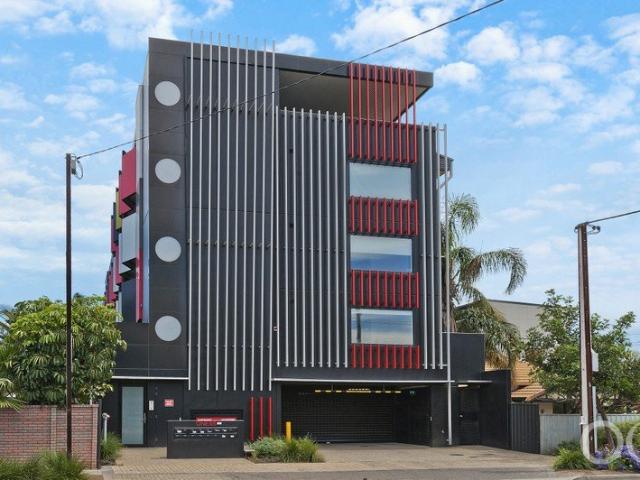 Open the Door to Secure, Contemporary Urban Living in a Highly Sought Prospect Location