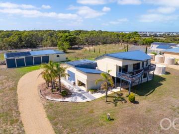 Open the Door to Spacious Acreage Living