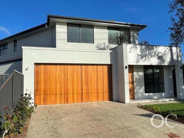 Open the Door To Spacious Coastal Living Moments from Glenelg Beach
