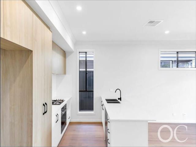Open the Door to Spacious Contemporary Living in a Brand New Greenacres Home