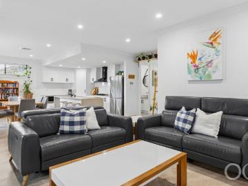 Open the Door to Spacious Family Living with Dual Level Comfort