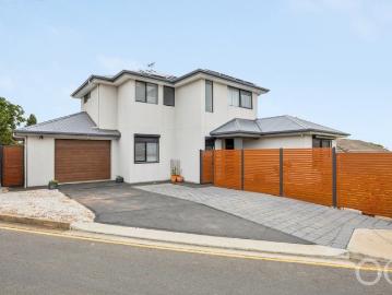 Open the Door to Spacious Family Living with Dual Level Comfort