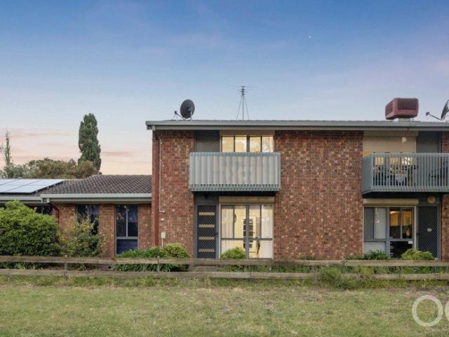 Open the Door to Spacious Living, Private Entertaining and a Park at the Front Door