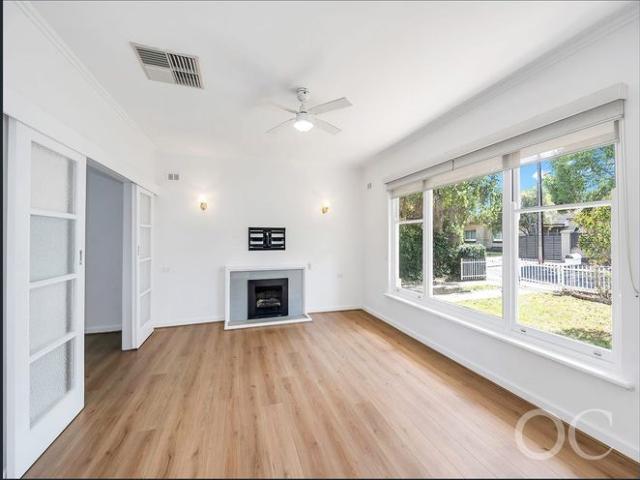 Open the Door to Timeless Comfort In A Blue Chip Location