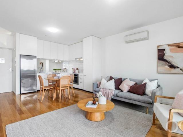 Open the Door to Top Floor Living with Eastern Views
