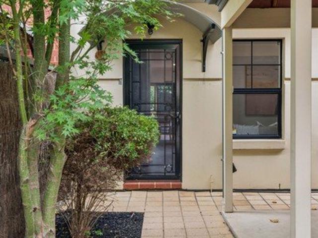 Open the Door to Townhouse Seclusion with a Social Life Worth Parading