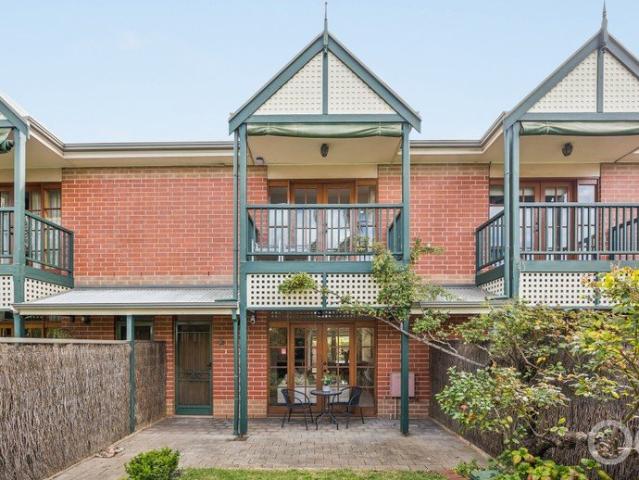 Open the Door to Updated Townhouse Ease with a City Fringe Footing and Hills Outlook