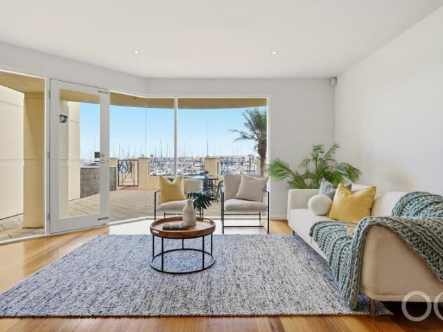 Open the Door to Waterfront Living With Marina Views, Sunsets & Dolphins