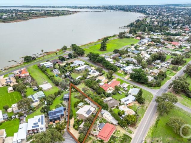 Open the Door to Your Own Riverside Piece of Paradise