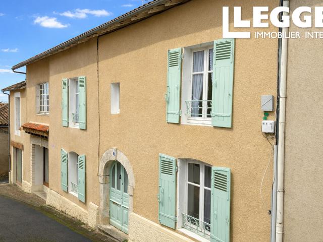 Opportunité rare: maison de 4/5 chambres avec jardin et grand commerce attenant à proximité de la ville