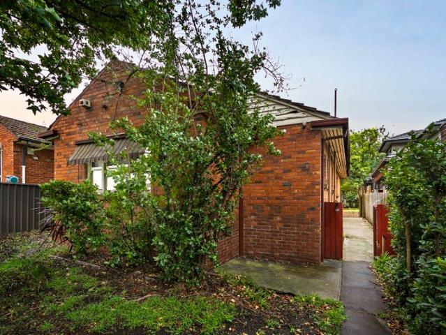 Opportunity Awaits on a Generous Block with Laneway Acess