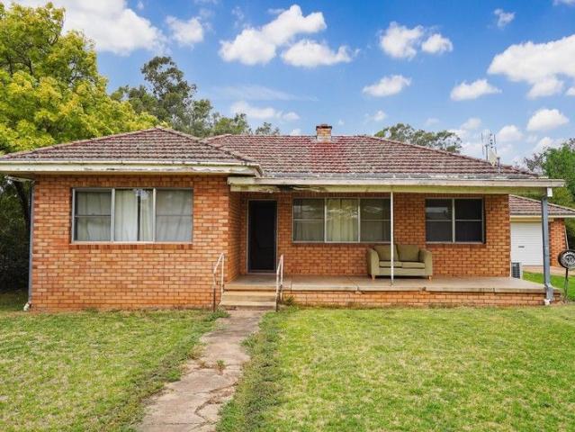 Opportunity awaits on this generous ¾ acre block with 2 bedroom home