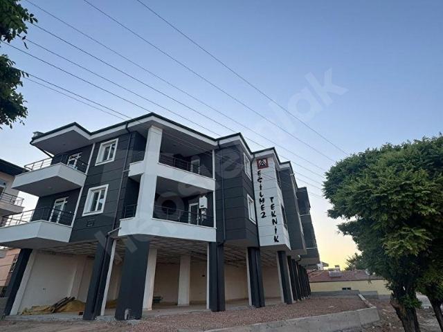 ORGANİZE YOLU ÜZERİ SATILIK SIFIR BİNA 1+1 YATIRIMLIK APART