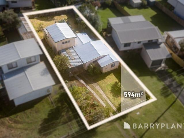 Original Beach Home Ready For Transformation With Bay Views!