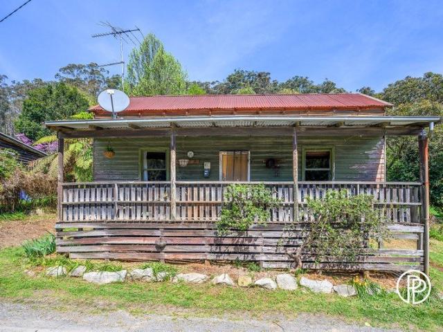 ORIGINAL COTTAGE BRIMMING WITH CHARACTER AND CHARM WITH THE STATE FOREST AT YOUR DOORSTEP