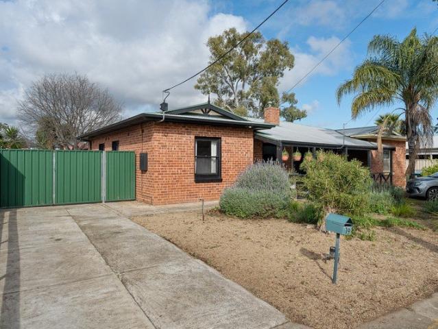 Original Pine Floors, Updated Rooms and a Proper Backyard